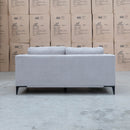 The Alara Two Seat Fabric Lounge - Light Grey available to purchase from Warehouse Furniture Clearance at our next sale event.