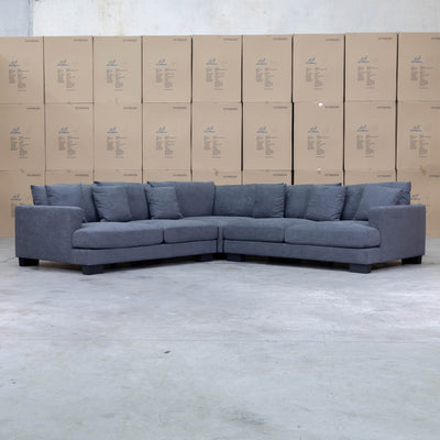 The Adelina Deep Seated Corner Lounge - Miss Charcoal available to purchase from Warehouse Furniture Clearance at our next sale event.