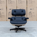 The Eames Replica Leather Chair and Ottoman - Black Leather available to purchase from Warehouse Furniture Clearance at our next sale event.