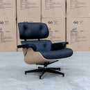 The Eames Replica Leather Chair and Ottoman - Black Leather available to purchase from Warehouse Furniture Clearance at our next sale event.