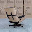 The Eames Replica Leather Chair and Ottoman - Black Leather available to purchase from Warehouse Furniture Clearance at our next sale event.