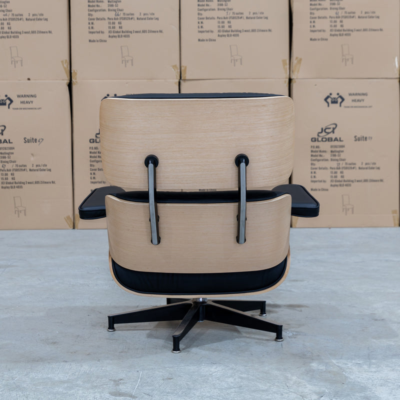 The Eames Replica Leather Chair and Ottoman - Black Leather available to purchase from Warehouse Furniture Clearance at our next sale event.