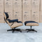 The Eames Replica Leather Chair and Ottoman - Black Leather available to purchase from Warehouse Furniture Clearance at our next sale event.