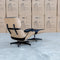 The Eames Replica Leather Chair and Ottoman - Black Leather available to purchase from Warehouse Furniture Clearance at our next sale event.