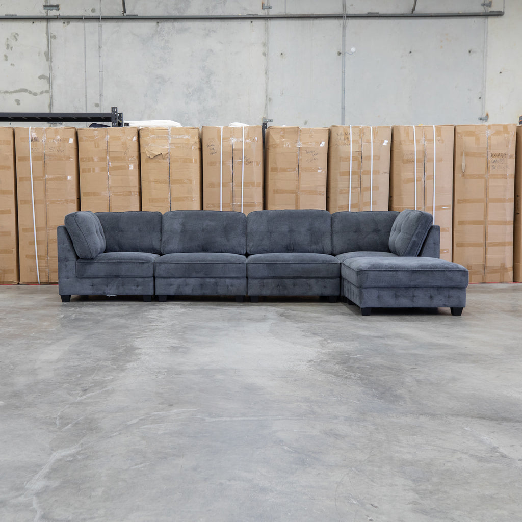 The Nobu Modular Corner Lounge with Ottoman - Carbon - PRE ORDER Available After 5th November available to purchase from Warehouse Furniture Clearance at our next sale event.