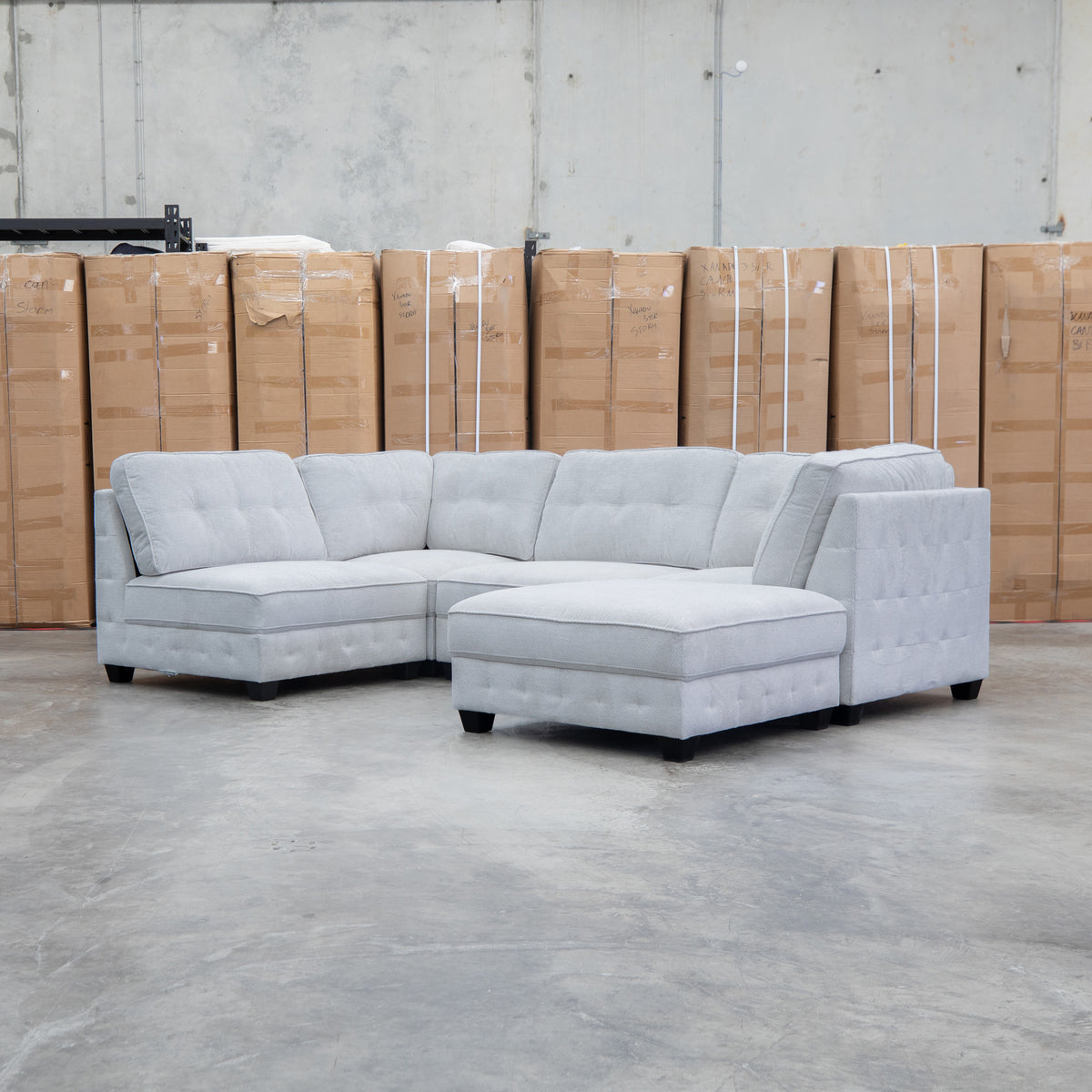 The Nobu Modular Corner Lounge with Ottoman - Oat - PRE ORDER Available After 5th November available to purchase from Warehouse Furniture Clearance at our next sale event.