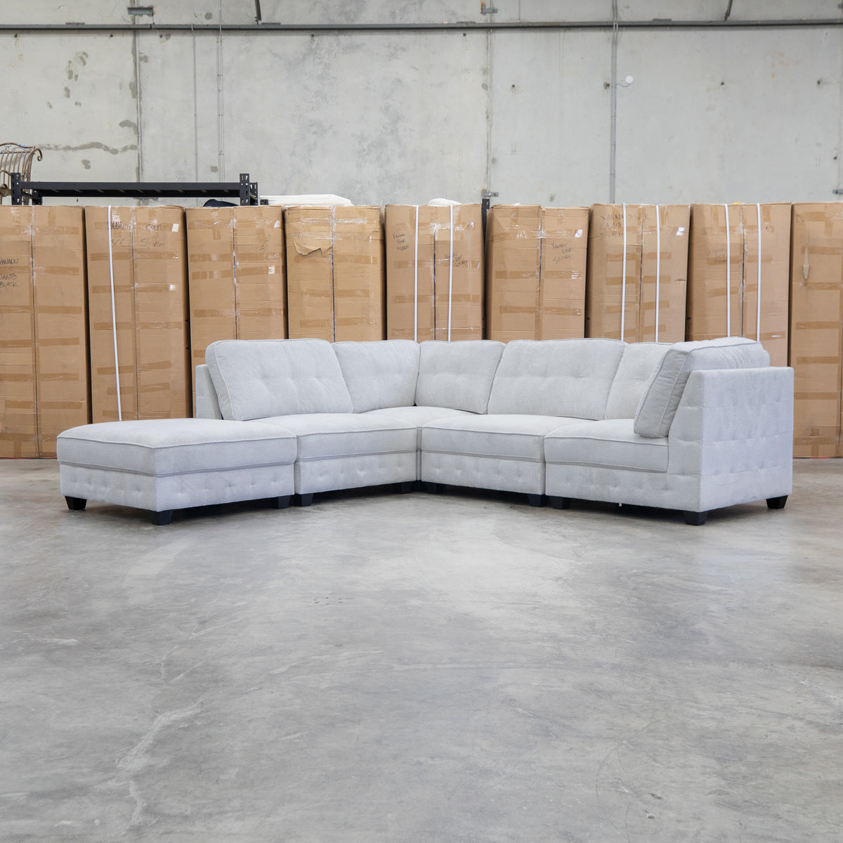 The Nobu Modular Corner Lounge with Ottoman - Oat - PRE ORDER Available After 5th November available to purchase from Warehouse Furniture Clearance at our next sale event.