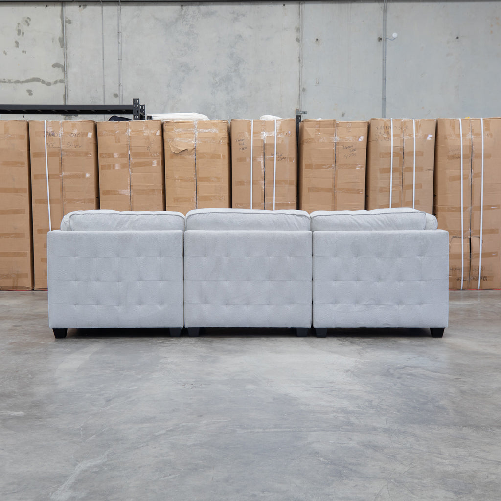 The Nobu Modular Corner Lounge with Ottoman - Oat - PRE ORDER Available After 5th November available to purchase from Warehouse Furniture Clearance at our next sale event.