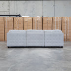 The Nobu Modular Corner Lounge with Ottoman - Oat - PRE ORDER Available After 5th November available to purchase from Warehouse Furniture Clearance at our next sale event.