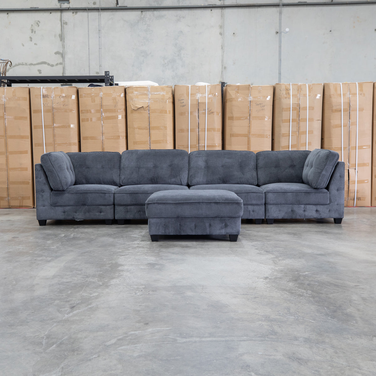 The Nobu Modular Corner Lounge with Ottoman - Carbon - PRE ORDER Available After 5th November available to purchase from Warehouse Furniture Clearance at our next sale event.