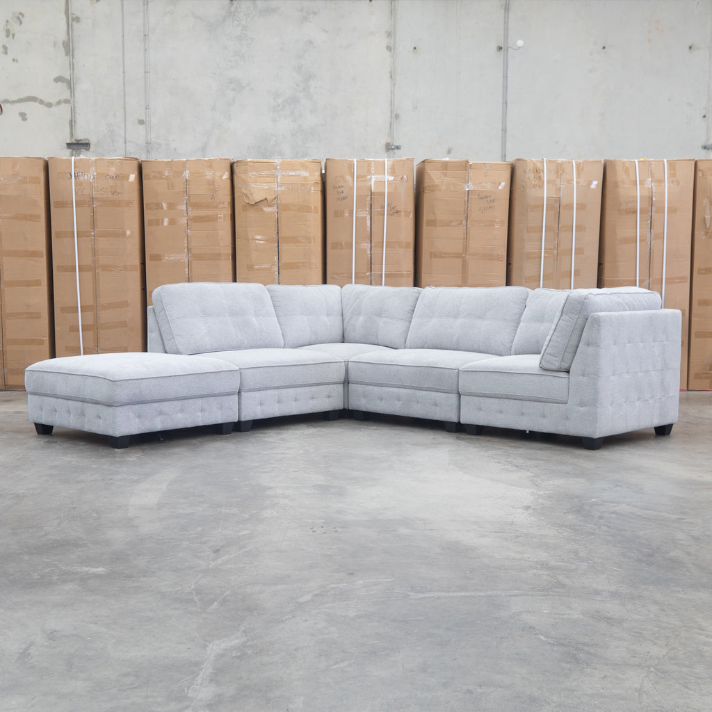The Nobu Modular Corner Lounge with Ottoman - Share Slate available to purchase from Warehouse Furniture Clearance at our next sale event.