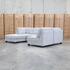 The Nobu Modular Corner Lounge with Ottoman - Share Slate available to purchase from Warehouse Furniture Clearance at our next sale event.