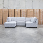 The Nobu Modular Corner Lounge with Ottoman - Share Slate available to purchase from Warehouse Furniture Clearance at our next sale event.