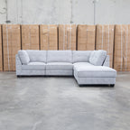 The Nobu Modular Corner Lounge with Ottoman - Share Slate available to purchase from Warehouse Furniture Clearance at our next sale event.