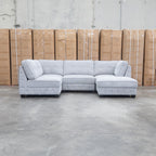 The Nobu Modular Corner Lounge with Ottoman - Share Slate available to purchase from Warehouse Furniture Clearance at our next sale event.