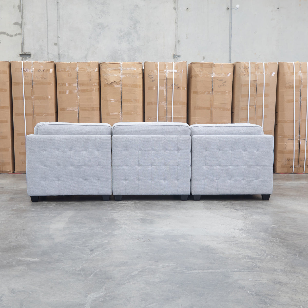 The Nobu Modular Corner Lounge with Ottoman - Share Slate available to purchase from Warehouse Furniture Clearance at our next sale event.