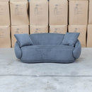 The Noosa Curved Fabric Two Seat Sofa - Dark Grey available to purchase from Warehouse Furniture Clearance at our next sale event.