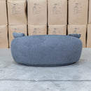 The Noosa Curved Fabric Two Seat Sofa - Dark Grey available to purchase from Warehouse Furniture Clearance at our next sale event.