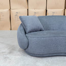 The Noosa Curved Fabric Two Seat Sofa - Dark Grey available to purchase from Warehouse Furniture Clearance at our next sale event.