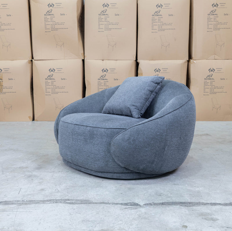 The Noosa Curved Fabric Armchair - Dark Grey available to purchase from Warehouse Furniture Clearance at our next sale event.