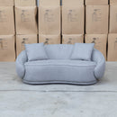 The Noosa Curved Fabric Two Seat Sofa - Light Grey available to purchase from Warehouse Furniture Clearance at our next sale event.