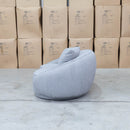 The Noosa Curved Fabric Two Seat Sofa - Light Grey available to purchase from Warehouse Furniture Clearance at our next sale event.