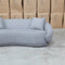 The Noosa Curved Fabric Three Seat Sofa - Light Grey available to purchase from Warehouse Furniture Clearance at our next sale event.