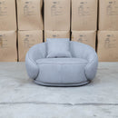 The Noosa Curved Fabric Armchair - Light Grey available to purchase from Warehouse Furniture Clearance at our next sale event.