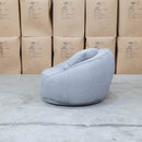 The Noosa Curved Fabric Armchair - Light Grey available to purchase from Warehouse Furniture Clearance at our next sale event.