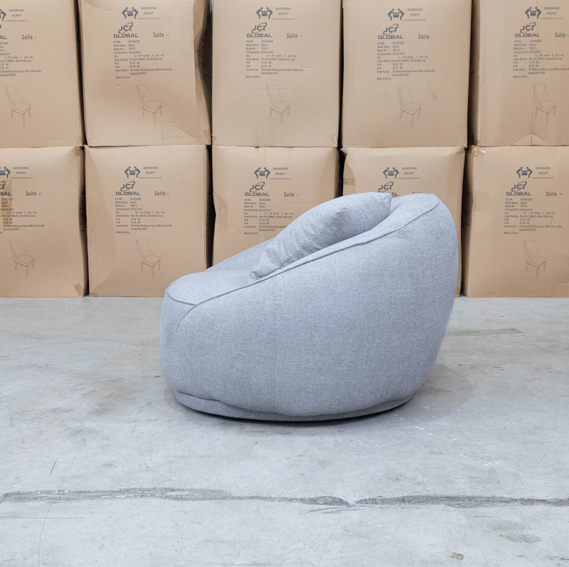 The Noosa Curved Fabric Armchair - Light Grey available to purchase from Warehouse Furniture Clearance at our next sale event.