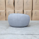 The Noosa Curved Fabric Armchair - Light Grey available to purchase from Warehouse Furniture Clearance at our next sale event.