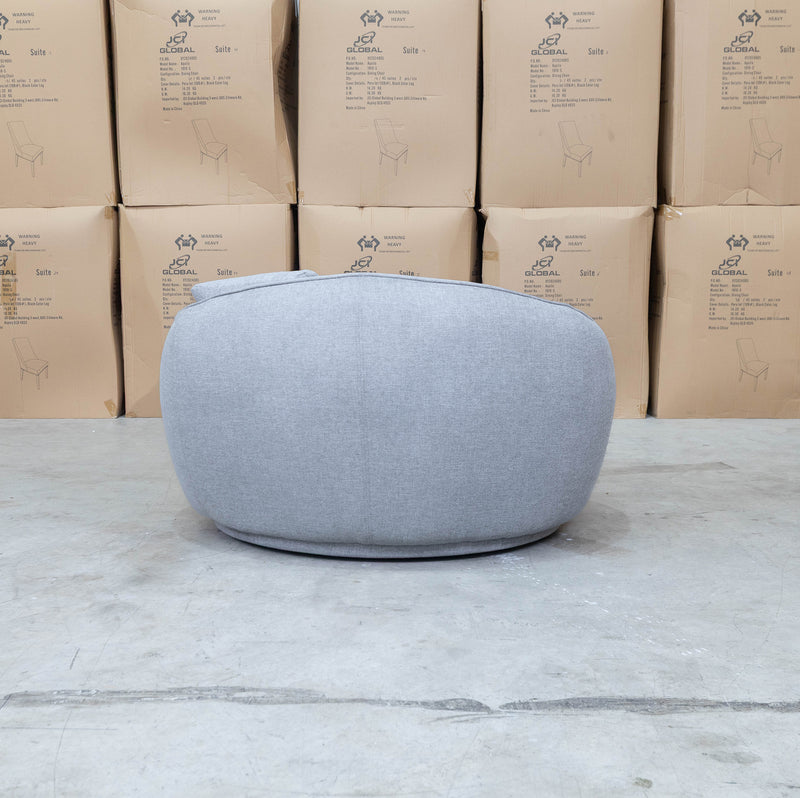 The Noosa Curved Fabric Armchair - Light Grey available to purchase from Warehouse Furniture Clearance at our next sale event.