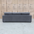 The Oakville Fabric Three Seat Sofa - Charcoal available to purchase from Warehouse Furniture Clearance at our next sale event.
