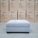 The Oakville Fabric Ottoman - Smoke available to purchase from Warehouse Furniture Clearance at our next sale event.