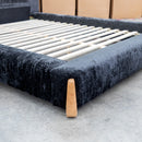 The Okina King Upholstered Bed - Black available to purchase from Warehouse Furniture Clearance at our next sale event.