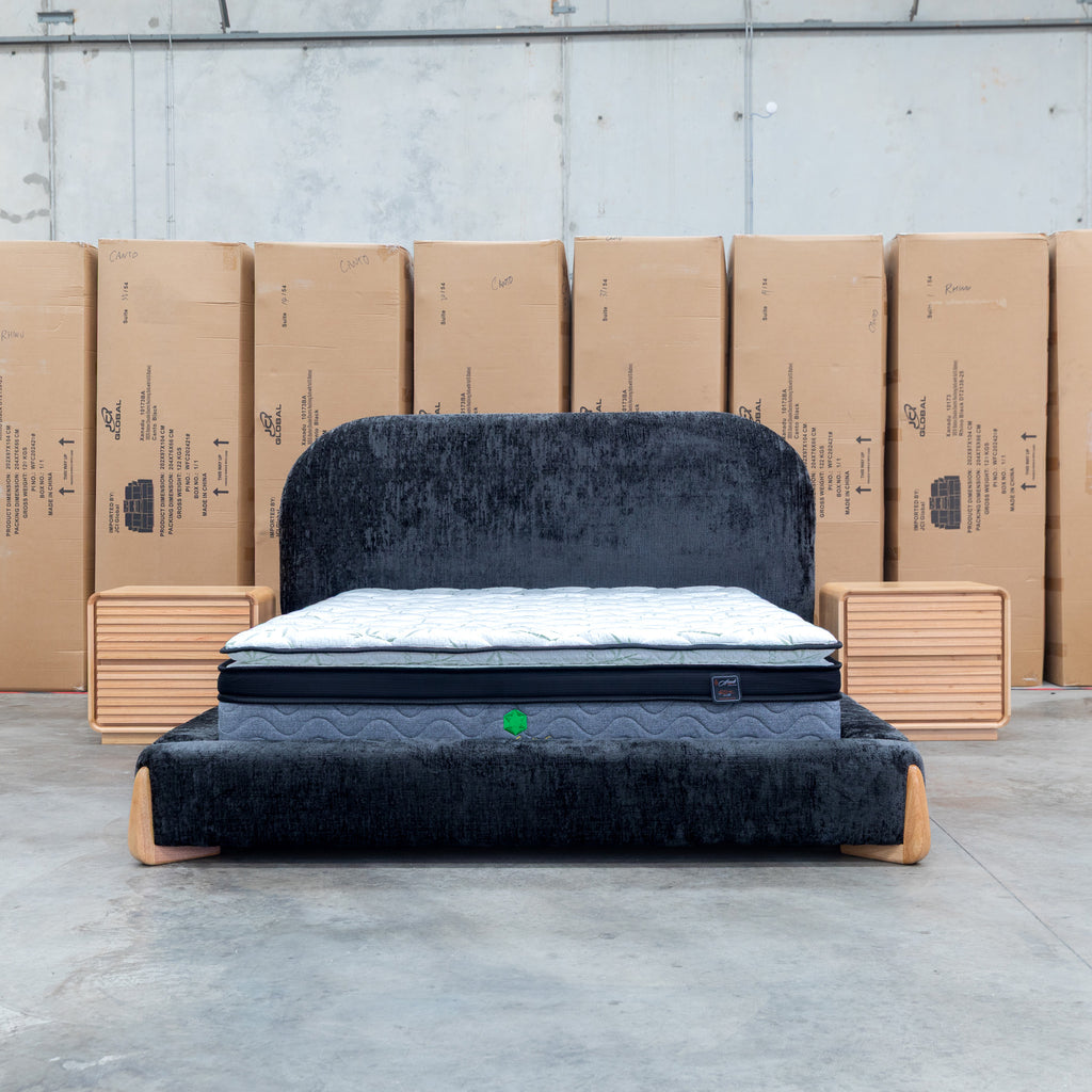 The Okina King Upholstered Bed - Black available to purchase from Warehouse Furniture Clearance at our next sale event.