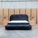 The Okina Queen Upholstered Bed - Black available to purchase from Warehouse Furniture Clearance at our next sale event.