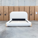 The Okina Queen Upholstered Bed - Cream available to purchase from Warehouse Furniture Clearance at our next sale event.