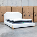 The Okina Queen Upholstered Bed - Cream available to purchase from Warehouse Furniture Clearance at our next sale event.