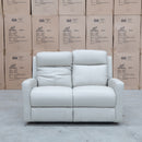 The Olsen Dual-Motor Two Seat Recliner Suite - Beige Leather available to purchase from Warehouse Furniture Clearance at our next sale event.