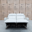 The Olsen Dual-Motor Two Seat Recliner Suite - Beige Leather available to purchase from Warehouse Furniture Clearance at our next sale event.