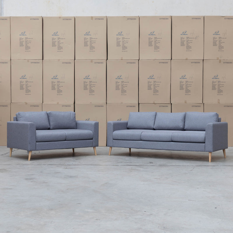 The Oslo 3 + 2 Seat Fabric Sofa Pair - Slate available to purchase from Warehouse Furniture Clearance at our next sale event.