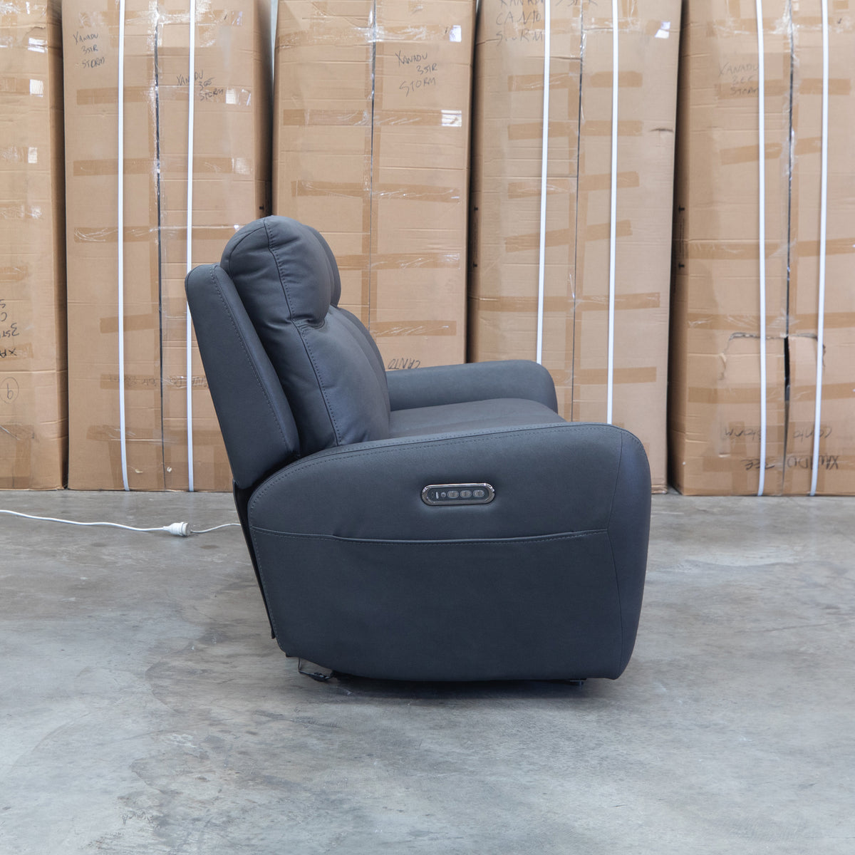 The Palm Cove Three Seater Triple Motor Electric Recliner Lounge - Coal available to purchase from Warehouse Furniture Clearance at our next sale event.