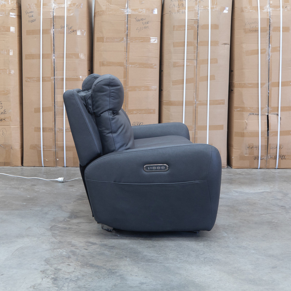 The Palm Cove Three Seater Triple Motor Electric Recliner Lounge - Coal available to purchase from Warehouse Furniture Clearance at our next sale event.