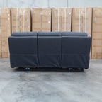 The Palm Cove Three Seater Triple Motor Electric Recliner Lounge - Coal available to purchase from Warehouse Furniture Clearance at our next sale event.