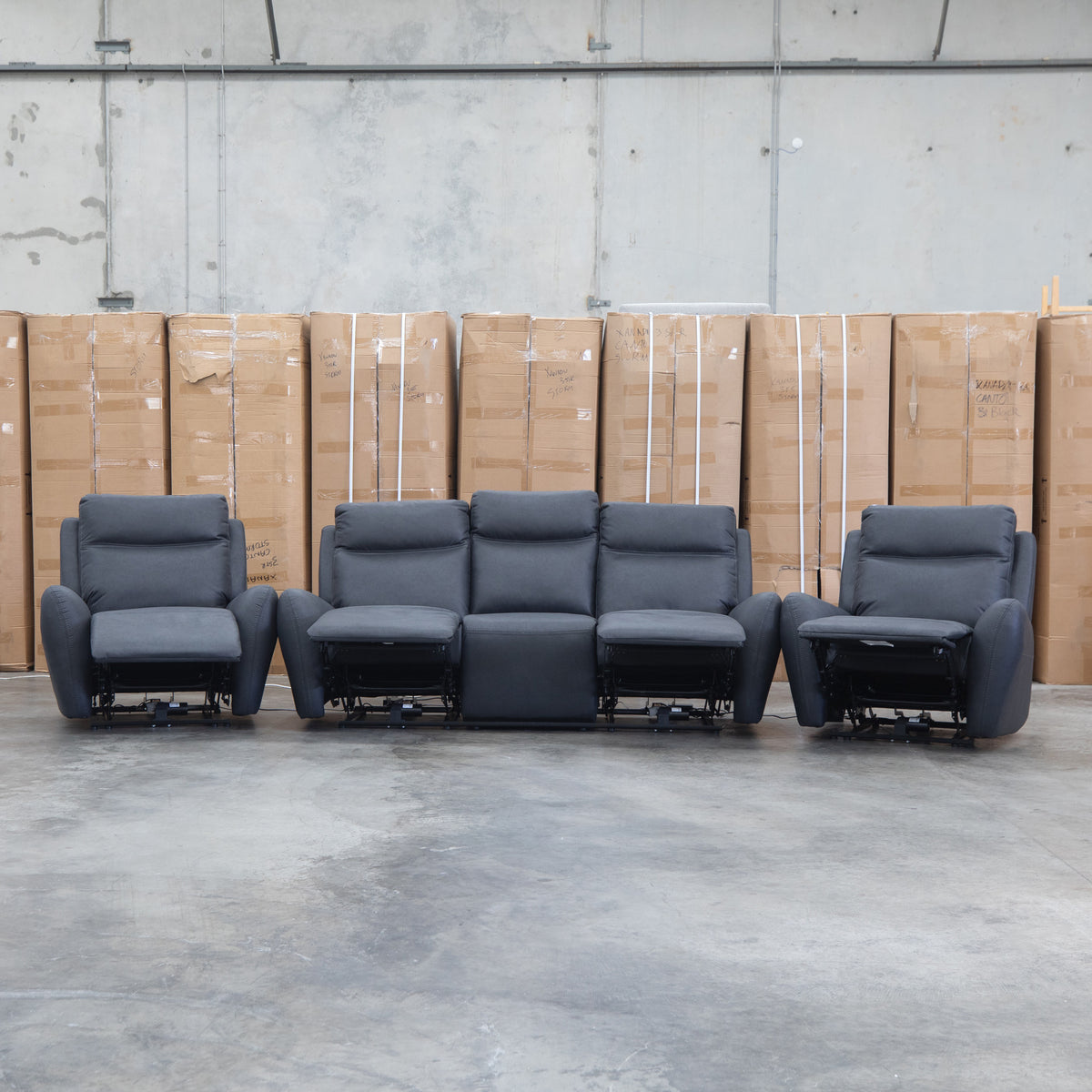The Palm Cove Three Seater Triple Motor Electric Recliner Lounge - Coal available to purchase from Warehouse Furniture Clearance at our next sale event.