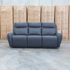 The Palm Cove Three Seater Triple Motor Electric Recliner Lounge - Coal available to purchase from Warehouse Furniture Clearance at our next sale event.