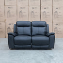 The Panama Two Seater Triple Motor Electric Recliner Lounge - Black Leather available to purchase from Warehouse Furniture Clearance at our next sale event.