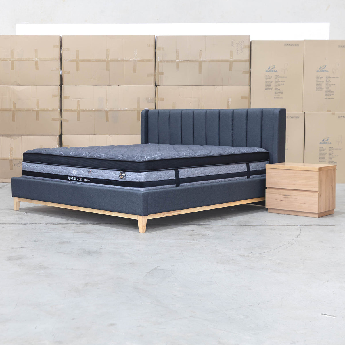 The Paros Double Upholstered Bed - Charcoal - PRE ORDER Available After 23rd October available to purchase from Warehouse Furniture Clearance at our next sale event.