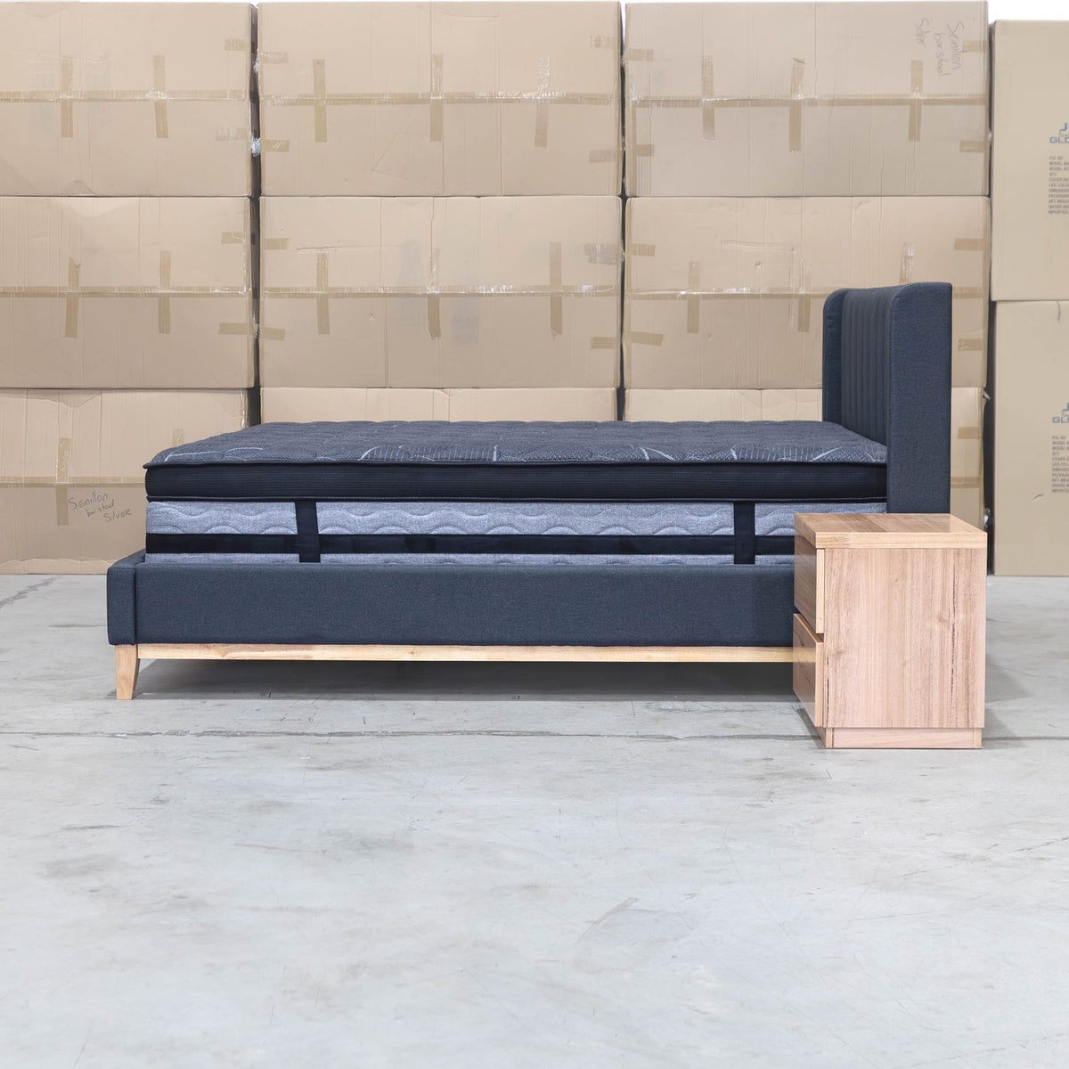 The Paros Double Upholstered Bed - Charcoal - PRE ORDER Available After 23rd October available to purchase from Warehouse Furniture Clearance at our next sale event.